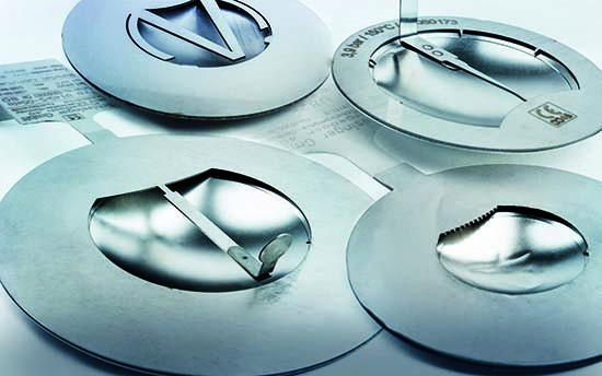 Reverse buckling bursting discs